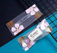 Set 200 Túi NOUGAT kẹo Sữa hạt HOA ĐÀO SWEET hàn miệng 4*9.5cm - Bí đỏ shop dụng cụ làm bánh