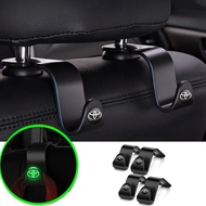 Toyota Car Luminous Multifunctional Hooks Auto Logo Hidden Seat Rear Hooks Decoration Accessories for Wish/Sienta/Hiace/Estima/Chr/Vios/Altis/Camry/Corolla