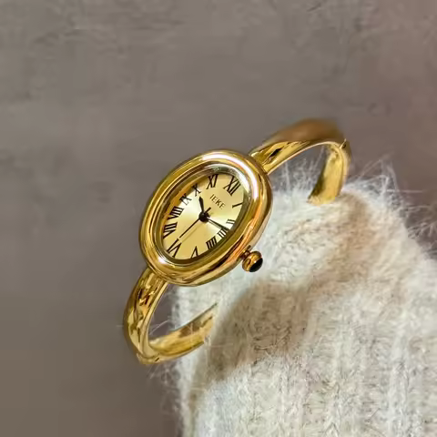 IEKE Fashion Bracelet Strap Bangle Watch Woman Roman Numeral Oval Dial Women's Quartz Watches Exquis