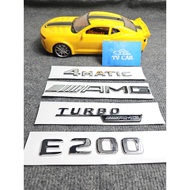 Braille letter E200 is pasted on the back of Mercedes-Benz E200