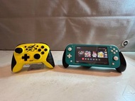 Nintendo Switch Lite + Grip + Pro Controller