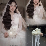 Bride's hand-held flower bouquet of falling tassels - for outdoor studios or studios