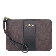 COACH กระเป๋าซิปคล้องมือ CORNER ZIP WRISTLET IN SIGNATURE COATED CANVAS WITH LEATHER STRIPE F58035
