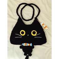 Handmade cat holding fish wool bag