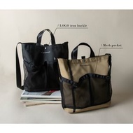 INTERVENE A4網布口袋斜背包