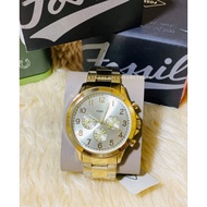 fossil mens watch gold