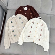 Girls' cardigan with embroidery along both sides