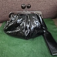 Black Clutch Brand Name