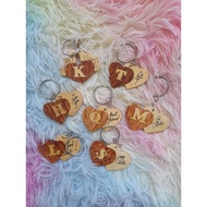 Set of 50 coconut wood letter keychains