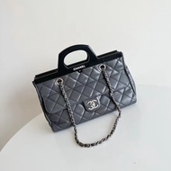 Chanel • 高稀大象灰油臘牛皮銀扣壓克力手柄衣架包