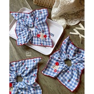 Cherry square Scrunchie with blue checkered background