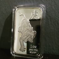 Sunshine Mint 1 oz Tiger Silver bar