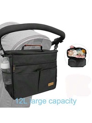 1個多功能嬰兒手推車掛袋用於嬰兒尿片收納,設有多個口袋,適用於母嬰用品