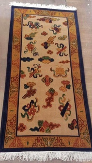 Indulge in the Timeless Elegance of this Exquisite Handcrafted Tibetan Wool Carpet! Made on a Cotton