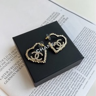 Chanel 鏤空愛心耳環