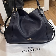 Coach Eddie Preloved