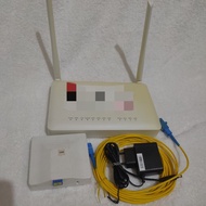 Router ZTE F670L 2022 Port Biru berikut adaptor dan kabel