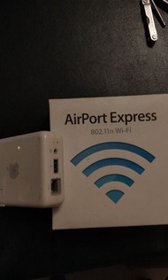 Apple airport express wifi router with remote printer and audio