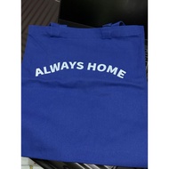 Always home in blue tote bag