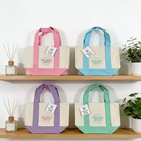 Trader Joe's mini macaron-colored canvas tote bags are reusable and eco-friendly shopping bags