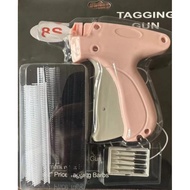 Tag gun/tagging gun/hijab pin shot