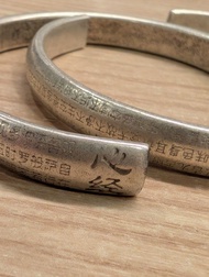 Selling together as a pair: antique Tibetan silver-plated copper Heart Sutra bracelet is crafted wit