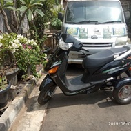Harisar - Sepeda Motor Listrik Roda 3