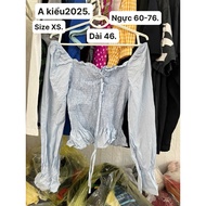 Women's shirt size XS.