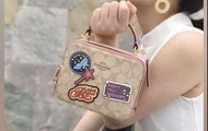 DISNEY X COACH BOX CROSSBODY IN SIGNATURE CANVAS WITH PATCHES