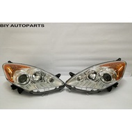 Perodua Alza 2010 lampu depan