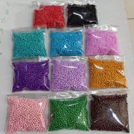 50 GRM SAND SEQUINS 8/S0 DOV