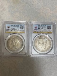 二個西班牙雙柱老銀幣，售價1200