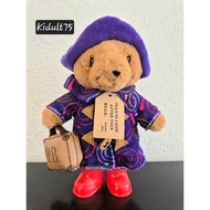 Paddington Bear with rain boots and a bag travelling around the world series - I love Paris