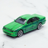 Majorette Nissan Cefiro A31 Model Car In Green Stripes.