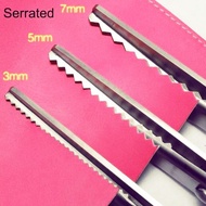 Edge cutting scissors _ serrated scissors