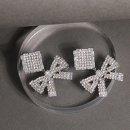 [ZANZAN ZANZAN] Anti-Allergic Silver Needle-Exaggerated Bow Rhinestone Earrings [Ek58bg026 _ A925]