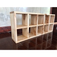 Pine Wood Shelf Divided Into 12 Cm Wide. Length 12 Cm. Height 12 Cm.total Size 12x69x28.5