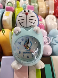 { BISA COD } Jam Weker Alarm Meja Karakter Kartun Hellokitty Doraemon Bentuk Telur - doraemon - sedi