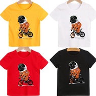 T-shirt for children with the image of a dog wearing a orange shirt riding a bicycle (Boys and girls