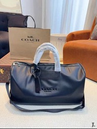 Coach蔻馳男包經典老花行李包手提大容量斜挎包