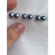 Akoya saltwater pearl earrings with silver handle