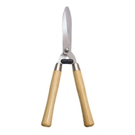 Hedge Shears Trimming Grass Plants