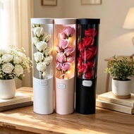 Bouquet Of Fake Roses In A Clear Cylindrical Box With Decorative Lights There Are 3 Colors Model 460
