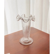 Cylindrical glass vase with striped wave mouth