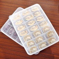 Frozen dumplings home kitchen fridge frozen dumplings Tupperware plastic egg carton dumplings