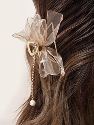 1入優雅網狀蝴蝶結設計,假珍珠和流蘇裝飾金屬鯊魚夾髮夾,鯊魚夾髮飾