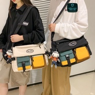 A4 AJECT large-sized crossbody bag for men and women for school and travel mixed blue and yellow sli