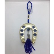 Evil eye with horseshoe hanging charm