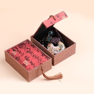 Brocade box containing feng shui bracelets - Lotus bag for bracelets - An An Feng Shui bracelet