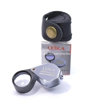 กล้องส่องพระ/ส่องเพรช Leikaสีเงิน เลนส์แก้วMulticoat 10x18mm แถมฟรีซองหนังวัวแท้ตรงรุ่น